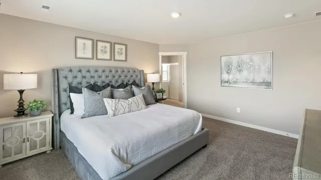 a bathroom with a double vanity sink mirror and shower