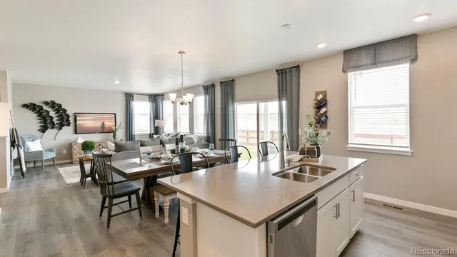 a view of a livingroom with furniture and a table