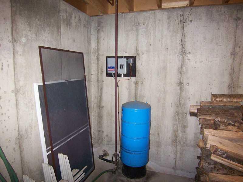 86 Magrath Road Wilton, ME 04294 - Photo 21 of 26 Basement. Well Pressure Tank