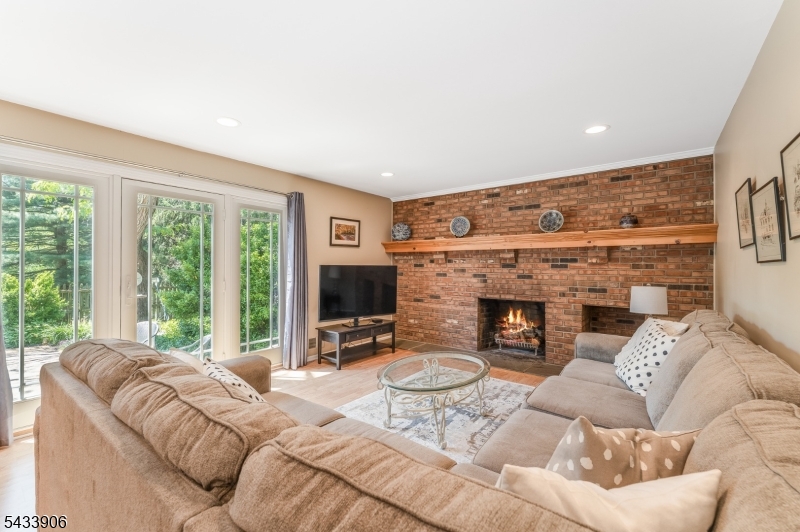 14 Lexington Road Annandale, NJ 08801 - Photo 16 of 47 a bedroom with furniture a fireplace and a large window