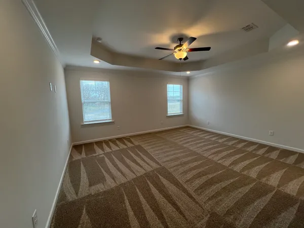 a bathroom with a double vanity sink and mirror