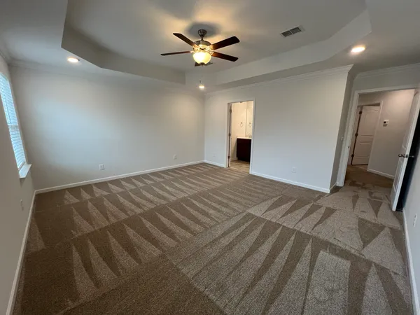a bathroom with a double vanity sink mirror and shower