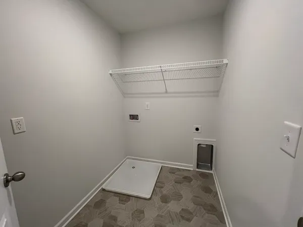 a bathroom with a sink a toilet a mirror and shower