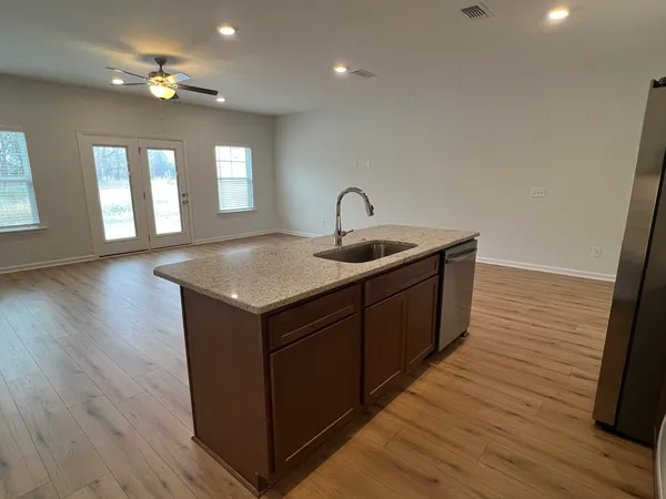 a bathroom with a sink toilet and vanity