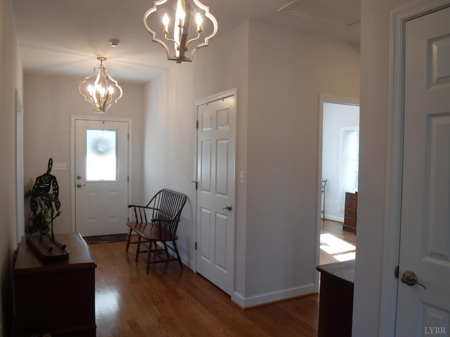 203 Longhill Road Goode, VA 24556 - Photo 10 of 26 a view of a livingroom with furniture and a window