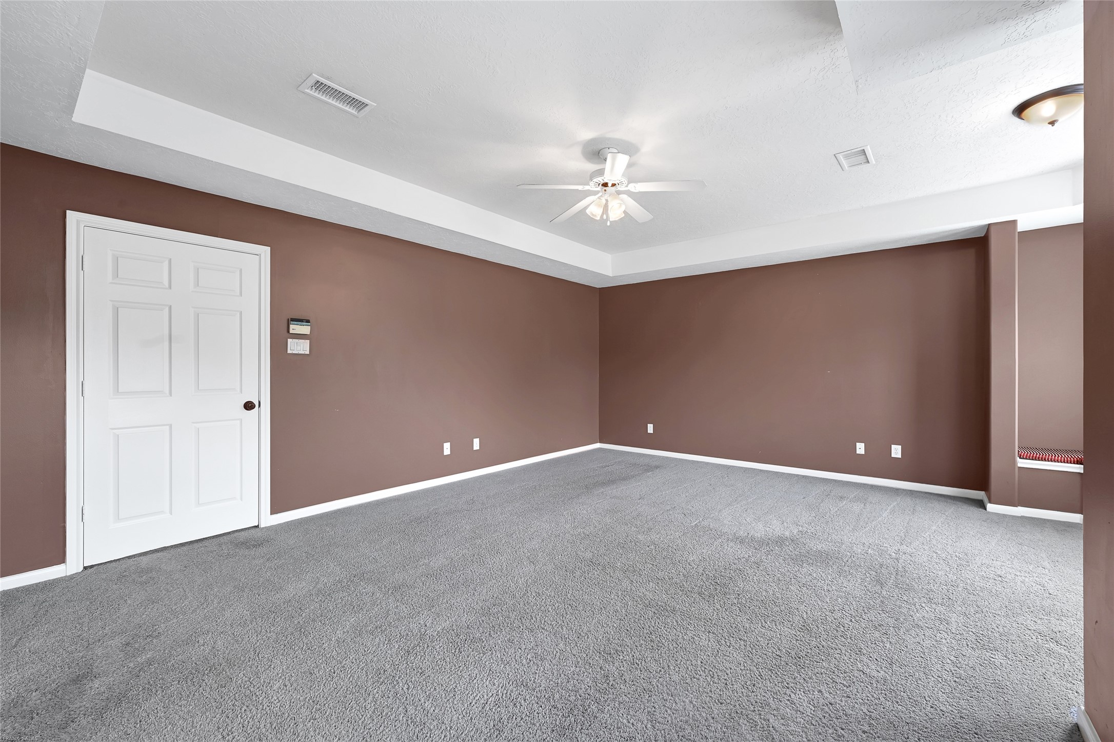10219 Sable Trail Lane Houston, TX 77064 - Photo 19 of 31 a view of an empty room with a ceiling fan
