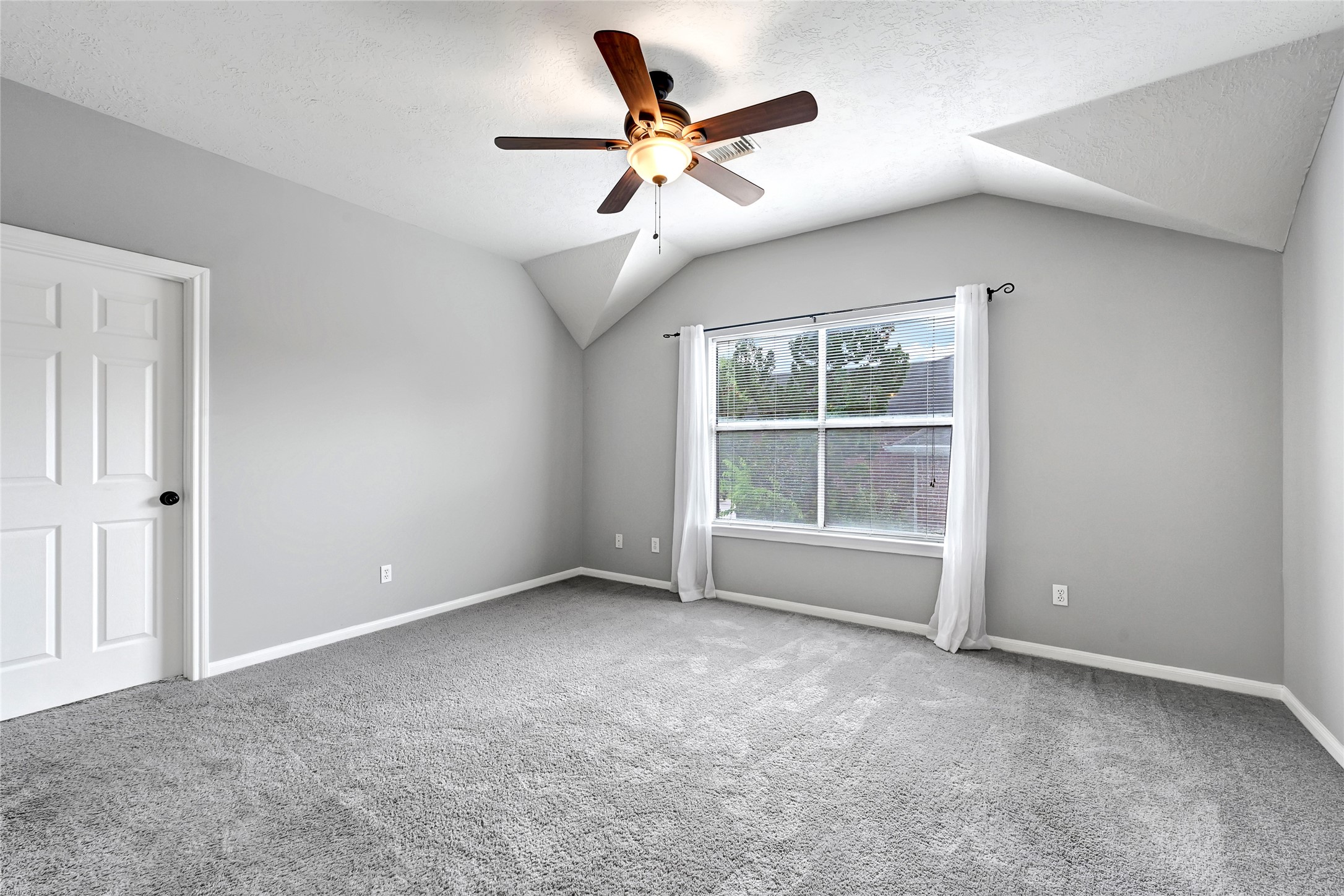 10219 Sable Trail Lane Houston, TX 77064 - Photo 26 of 31 a view of an empty room with a window