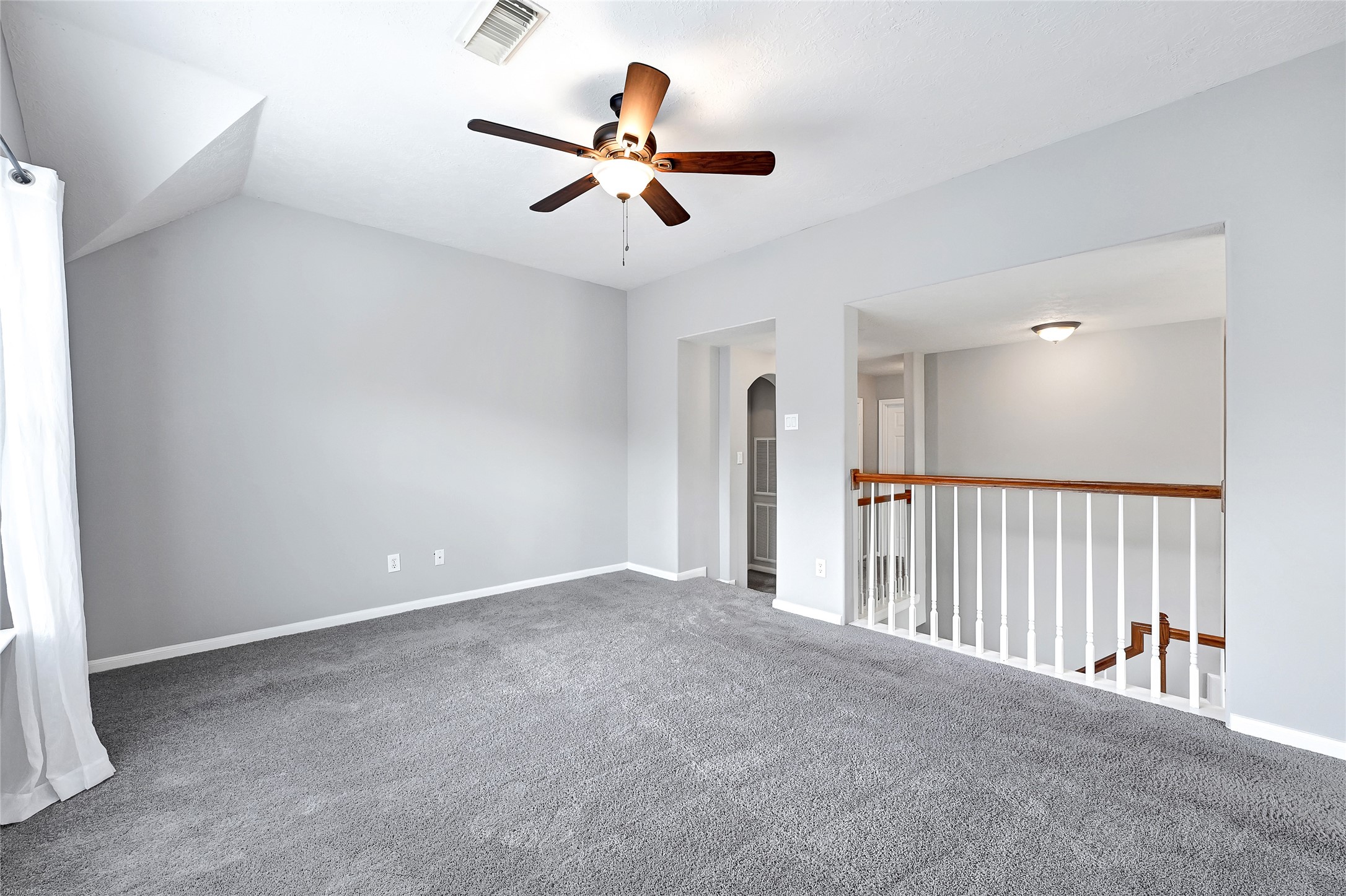 10219 Sable Trail Lane Houston, TX 77064 - Photo 27 of 31 a view of a livingroom with a ceiling fan and window