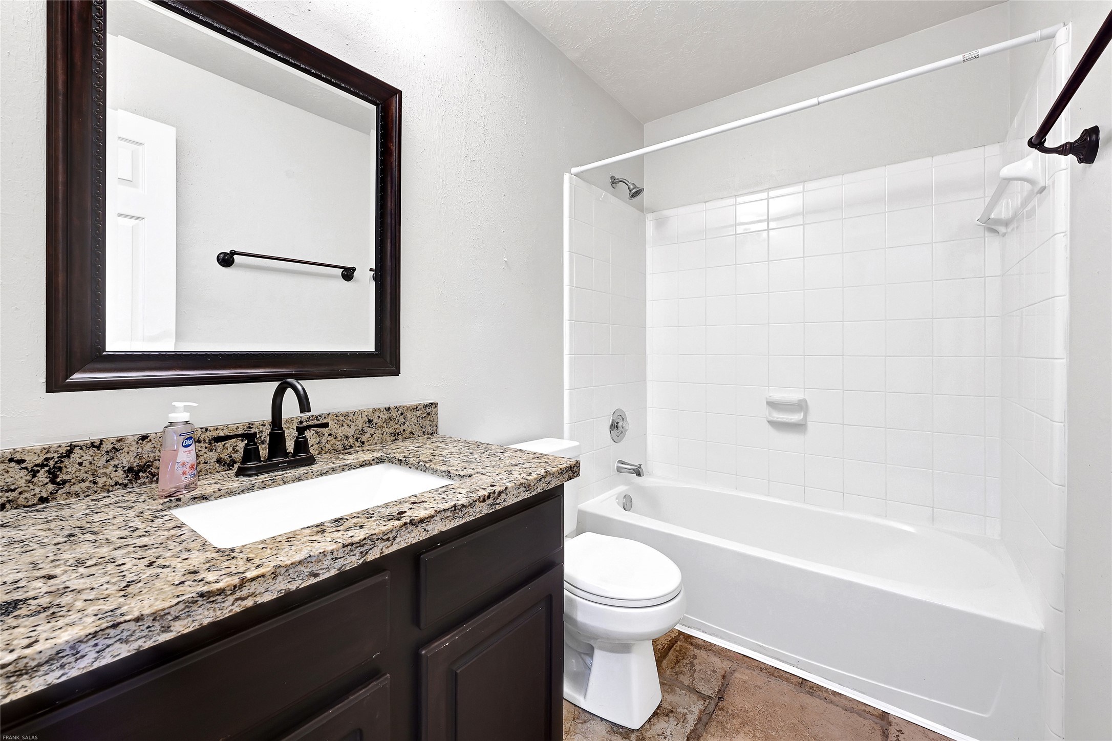 10219 Sable Trail Lane Houston, TX 77064 - Photo 29 of 31 a bathroom with a granite countertop sink toilet and shower