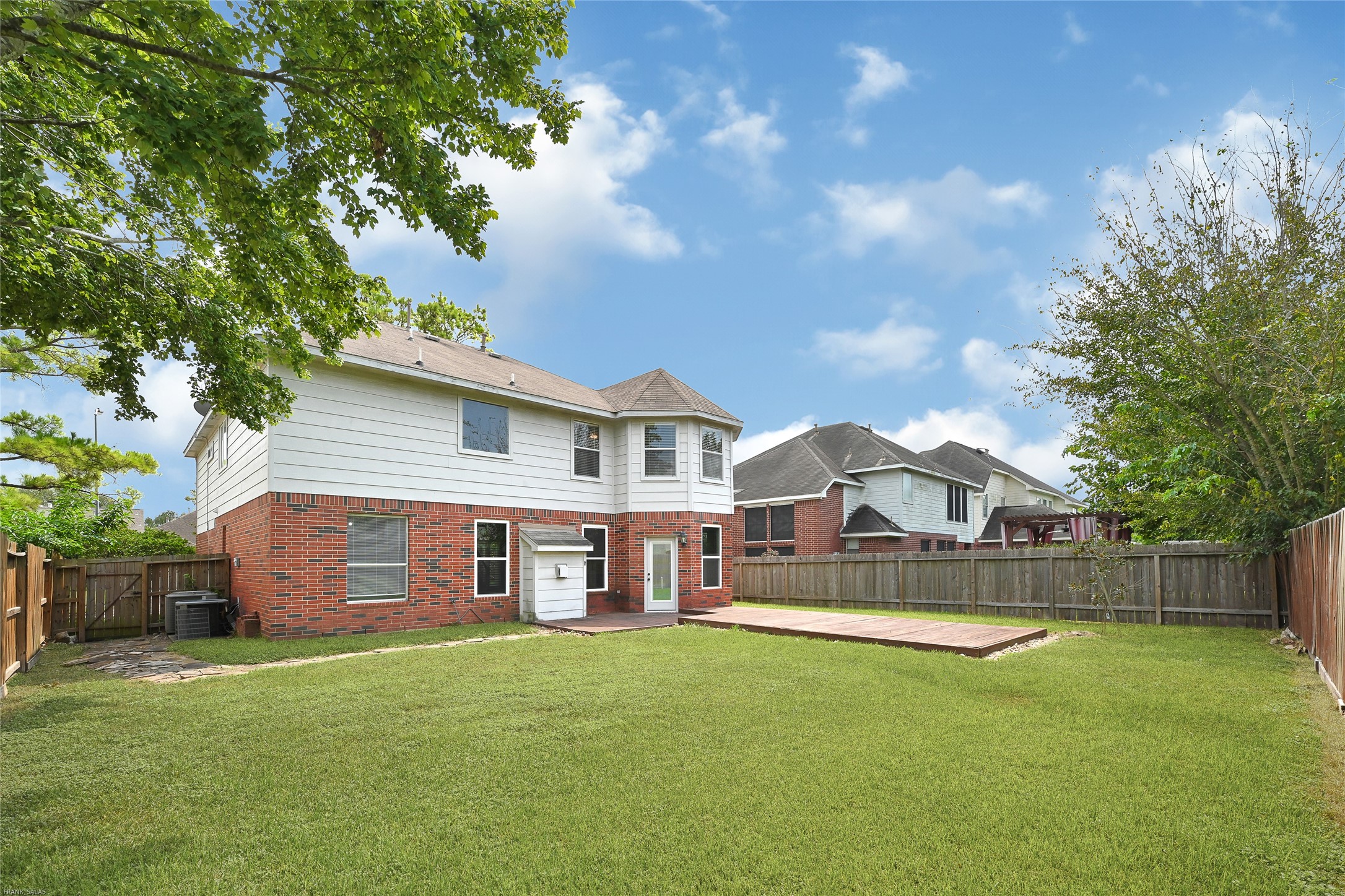 10219 Sable Trail Lane Houston, TX 77064 - Photo 31 of 31 a view of a house with a backyard