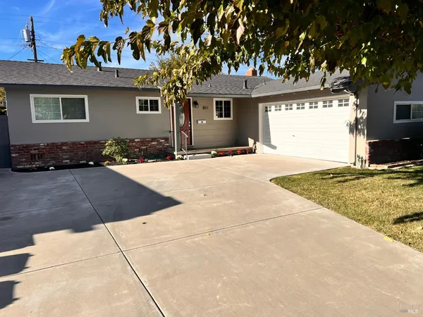 a view of a house with a patio