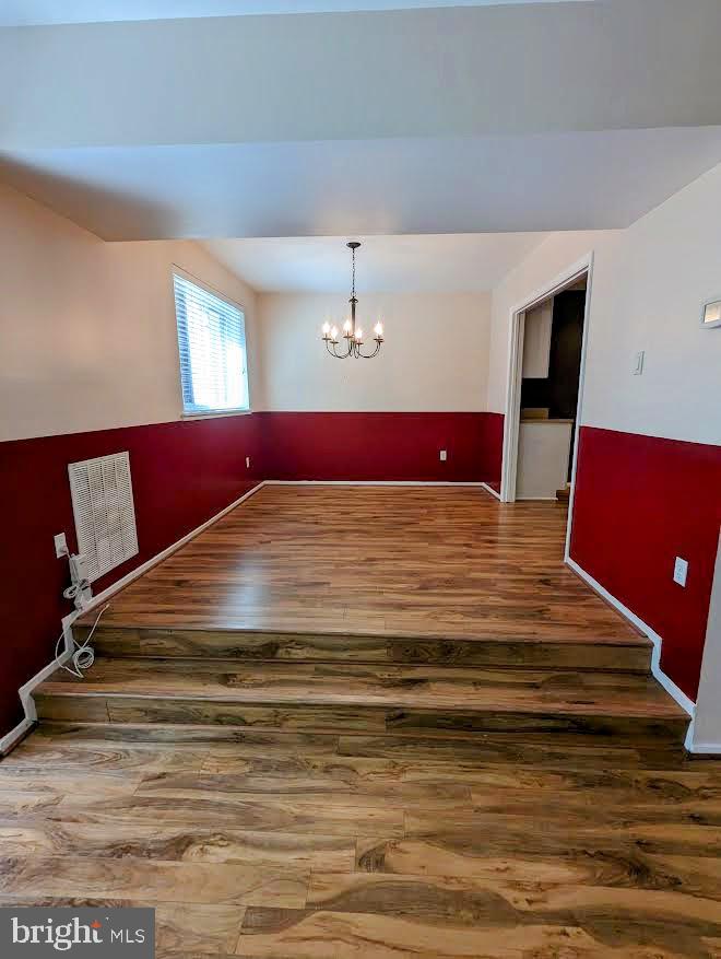 1621 Parkcrest Circle, Unit 101 Reston, VA 20190 - Photo 3 of 16 a view of bedroom with furniture and window
