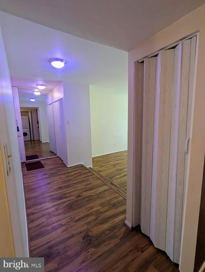 1621 Parkcrest Circle, Unit 101 Reston, VA 20190 - Photo 9 of 16 a view of a hallway with wooden floor