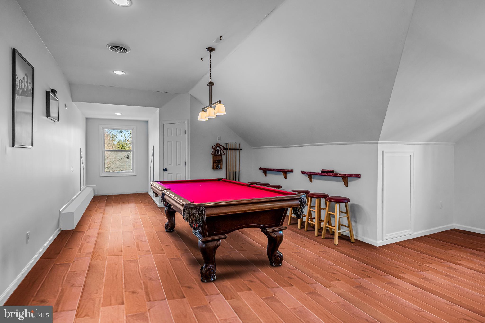 512 North Stanwick Road Moorestown, NJ 08057 - Photo 54 of 73 a room with pool table wooden floor and chandelier
