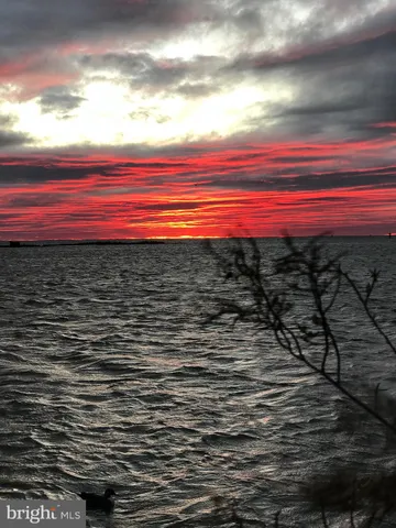 an aerial view of a highlighted house