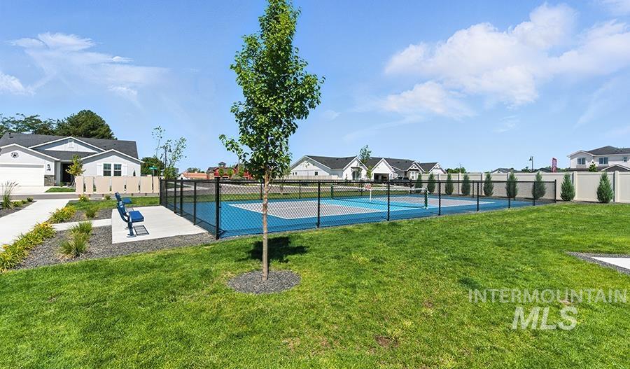2311 North Silver Wolf Place Star, ID 83669 - Photo 41 of 44 View of basketball court with a tennis court and a residential view