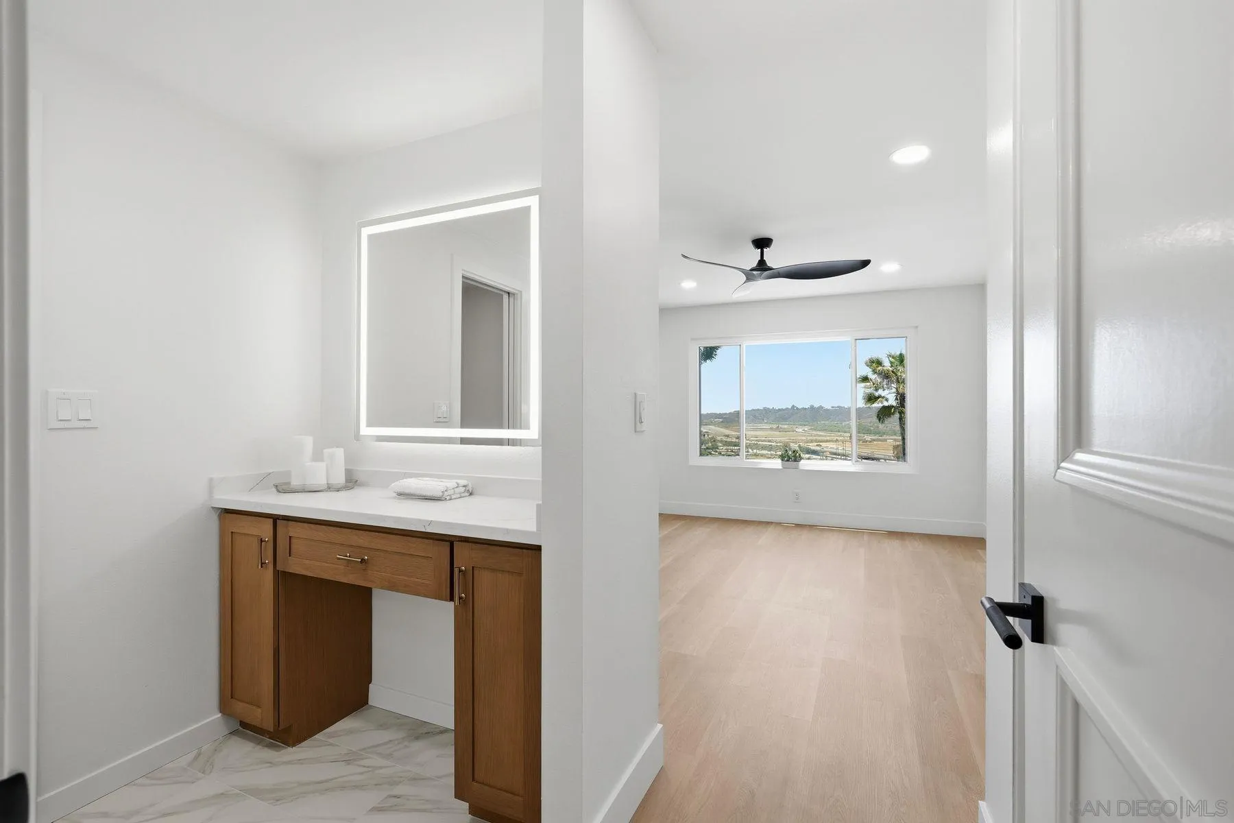3606 Vista Rey, Unit 46 Oceanside, CA 92057 - Photo 14 of 36 a view of a kitchen from the hallway
