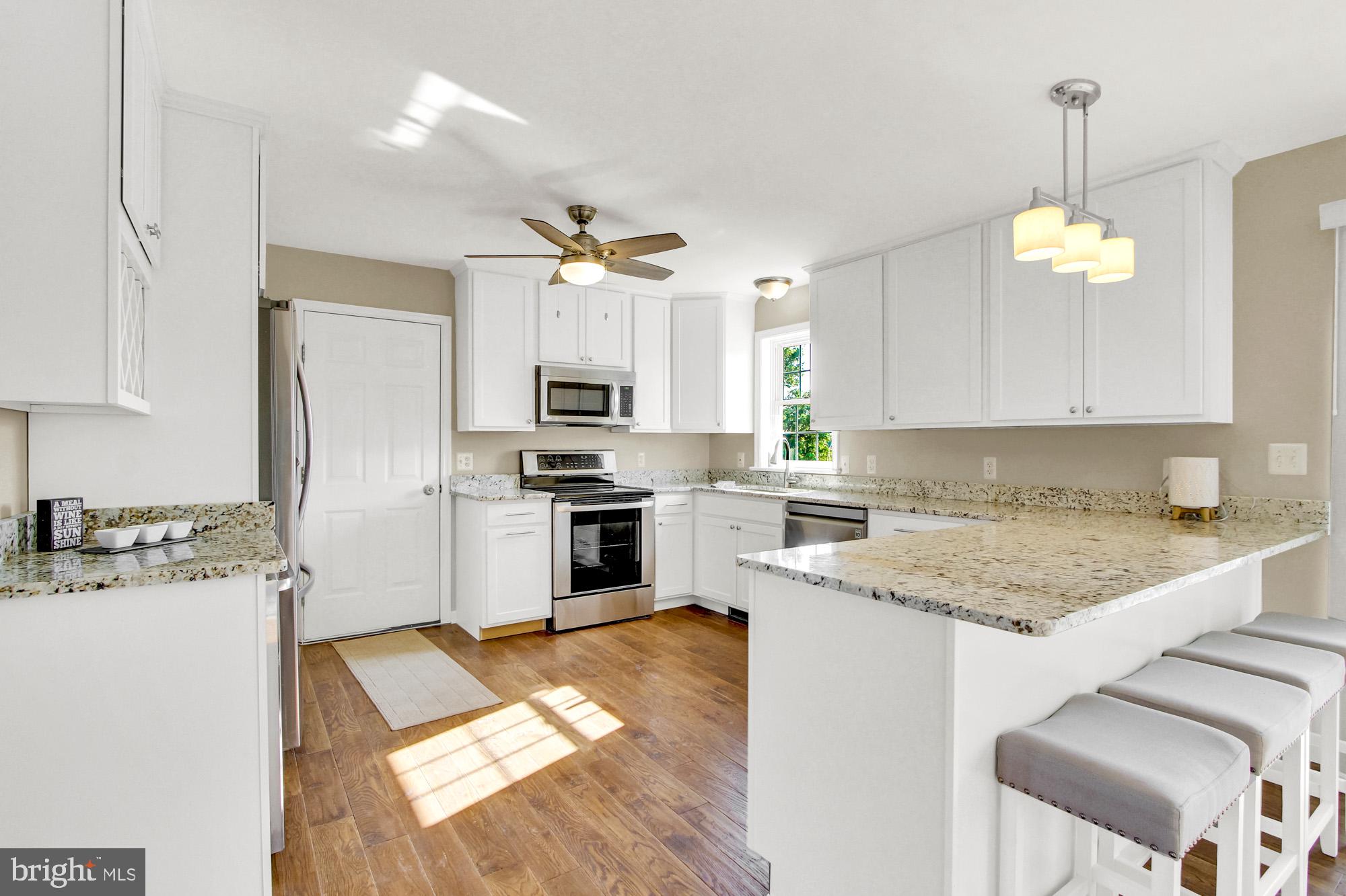 2227 Stoverstown Road Spring Grove, PA 17362 - Photo 6 of 39 Spacious kitchen with wide plank hardwood floors