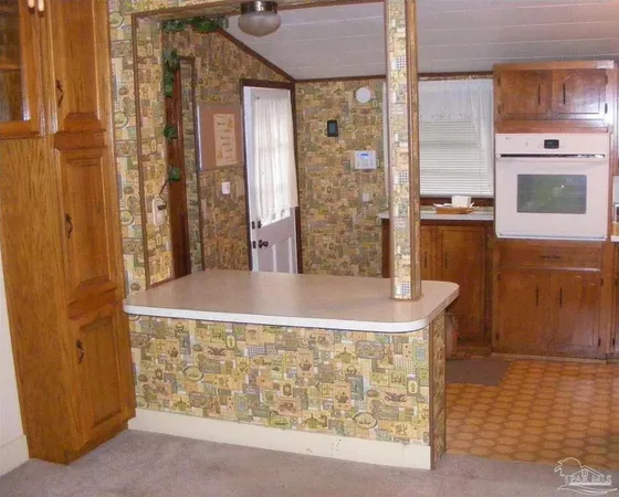 a room with a table and a stove
