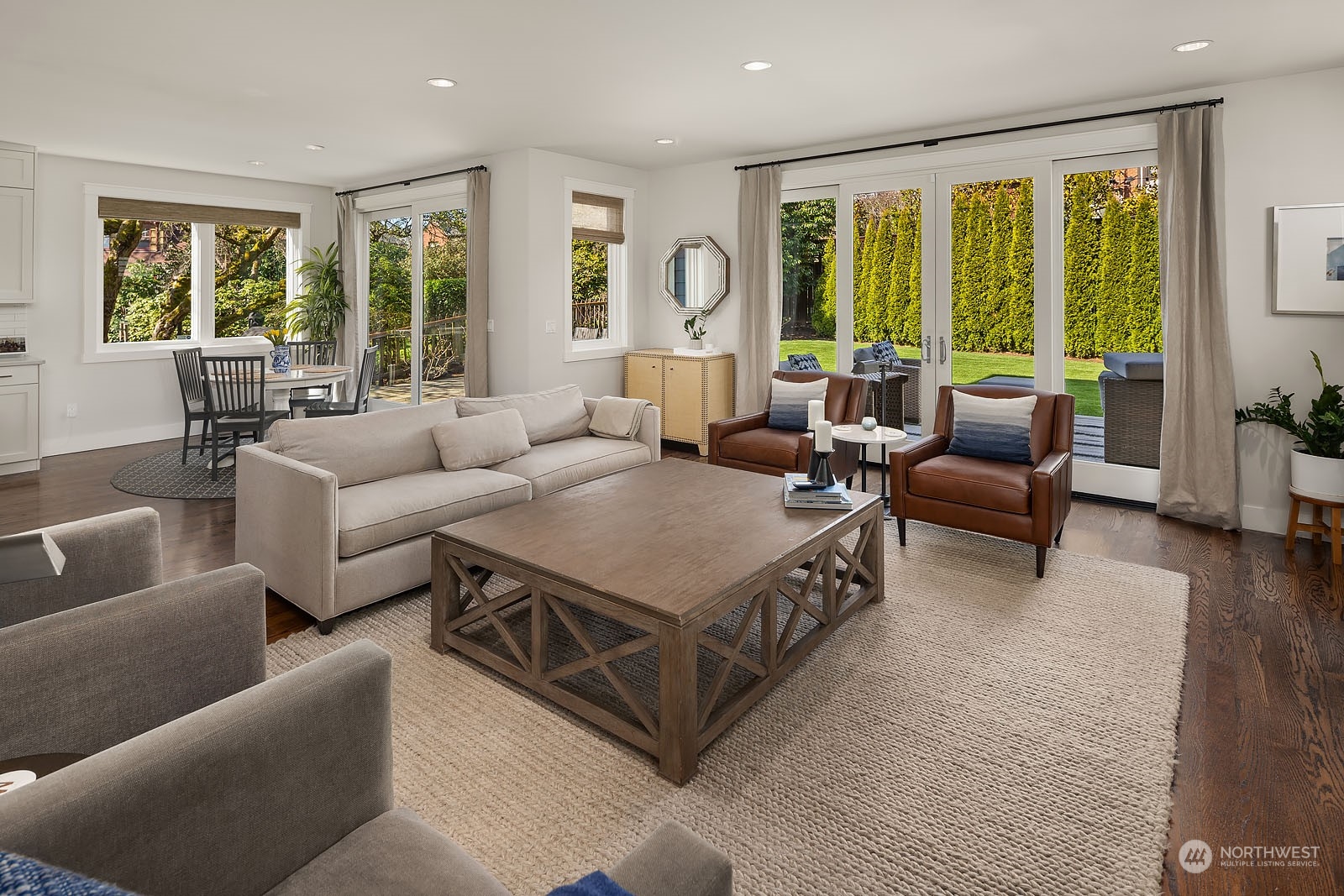 5108 Northeast 42nd Street Seattle, WA 98105 - Photo 11 of 40 a living room with furniture and large windows