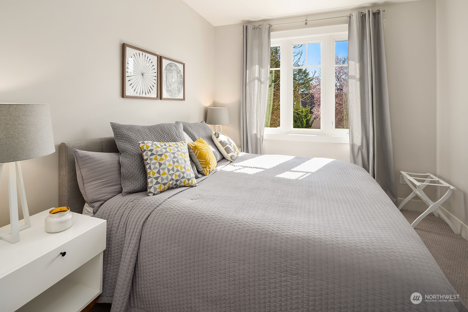 5108 Northeast 42nd Street Seattle, WA 98105 - Photo 13 of 40 a bedroom with a bed and a window