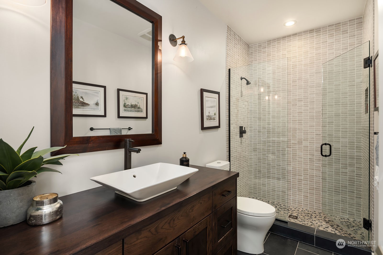 5108 Northeast 42nd Street Seattle, WA 98105 - Photo 14 of 40 a bathroom with a sink toilet and shower