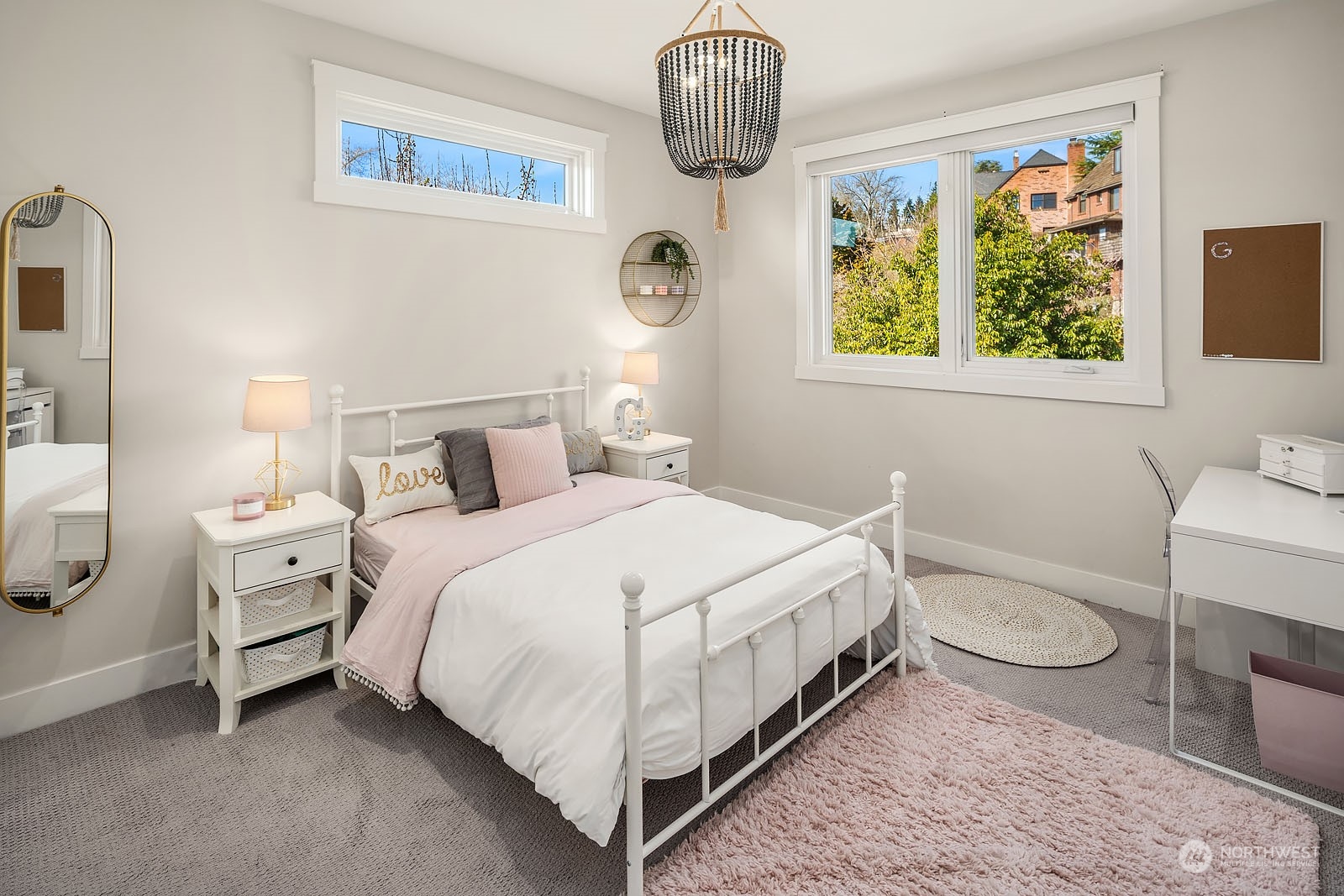 5108 Northeast 42nd Street Seattle, WA 98105 - Photo 19 of 40 a bedroom with a bed and window