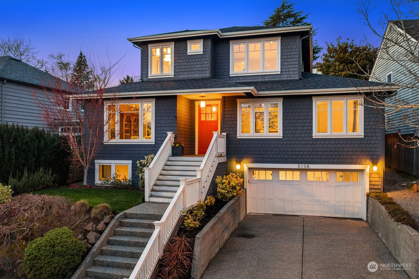 5108 Northeast 42nd Street Seattle, WA 98105 - Photo 2 of 40 a view of a house with a yard