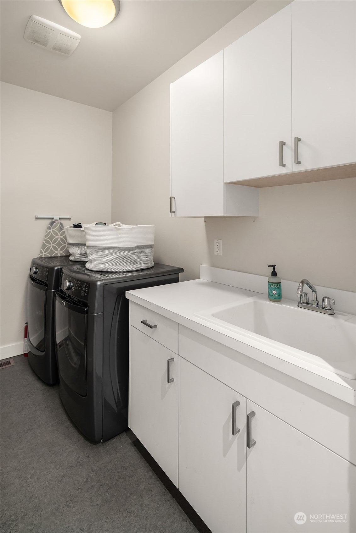 5108 Northeast 42nd Street Seattle, WA 98105 - Photo 22 of 40 a utility room with dryer and washer