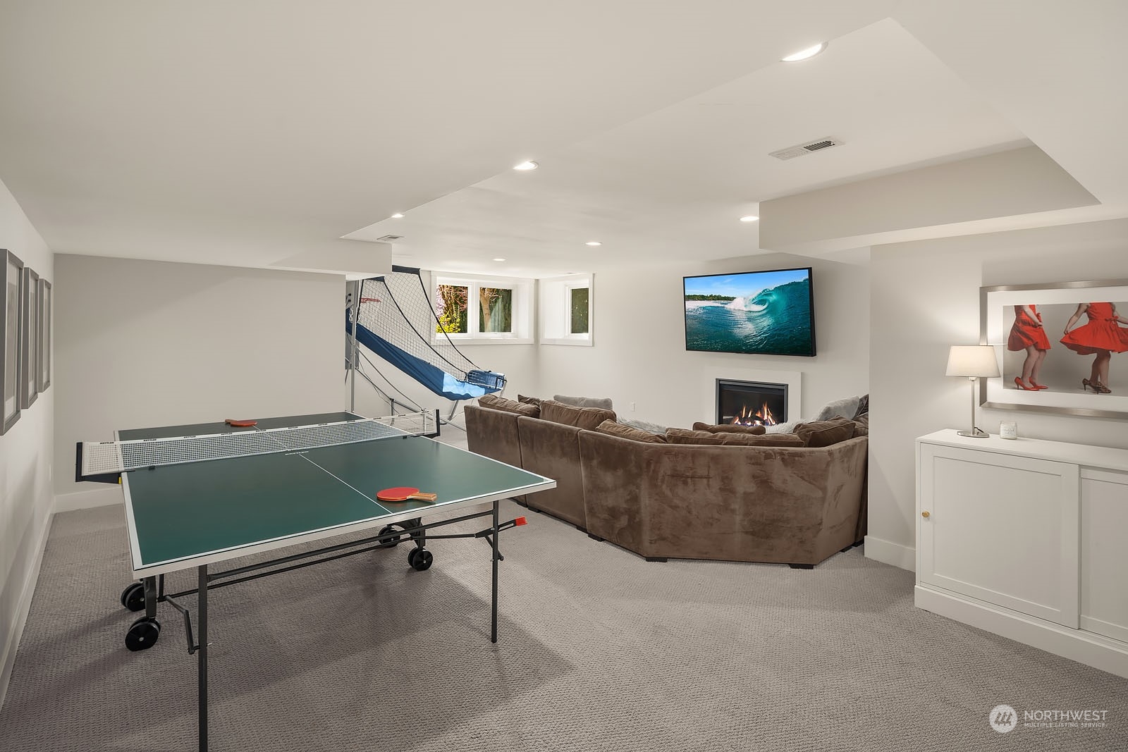 5108 Northeast 42nd Street Seattle, WA 98105 - Photo 23 of 40 a living room with furniture and a flat screen tv