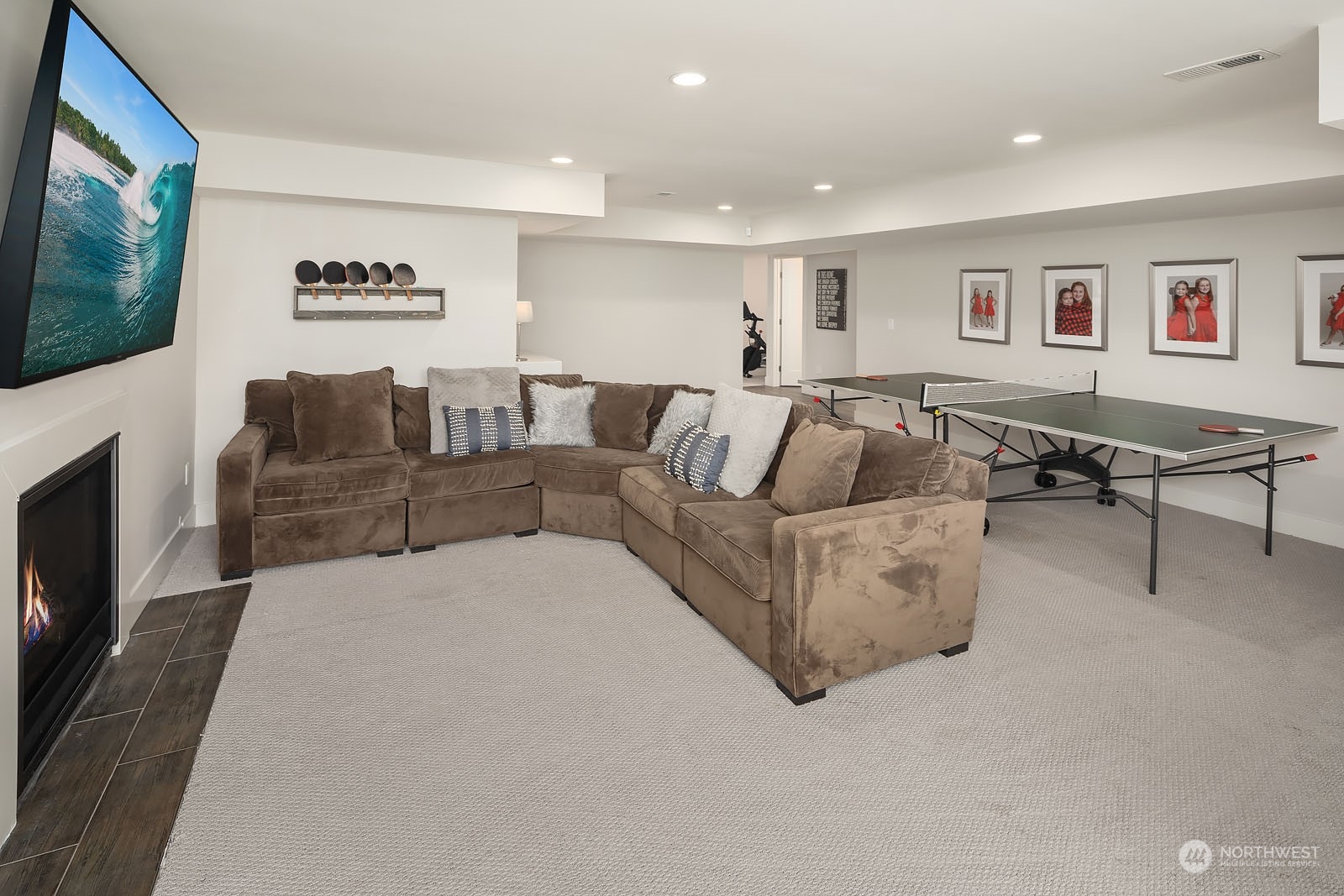 5108 Northeast 42nd Street Seattle, WA 98105 - Photo 24 of 40 a living room with furniture and a flat screen tv