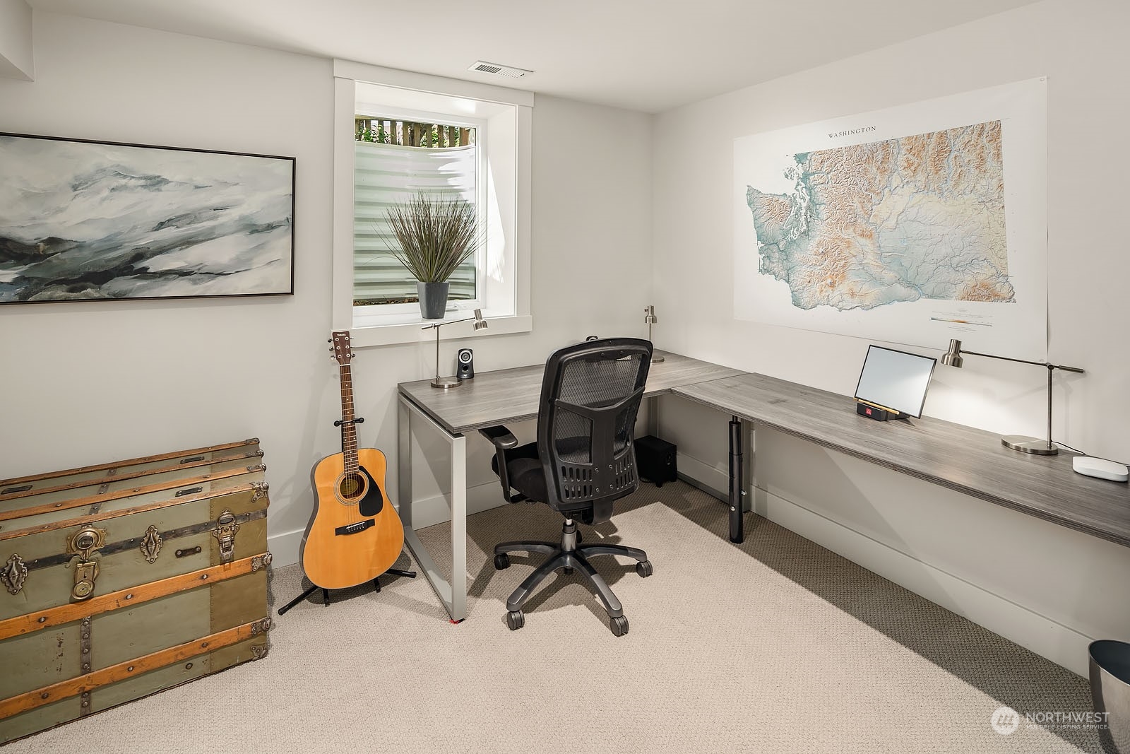 5108 Northeast 42nd Street Seattle, WA 98105 - Photo 26 of 40 a view of a workspace with furniture and a window