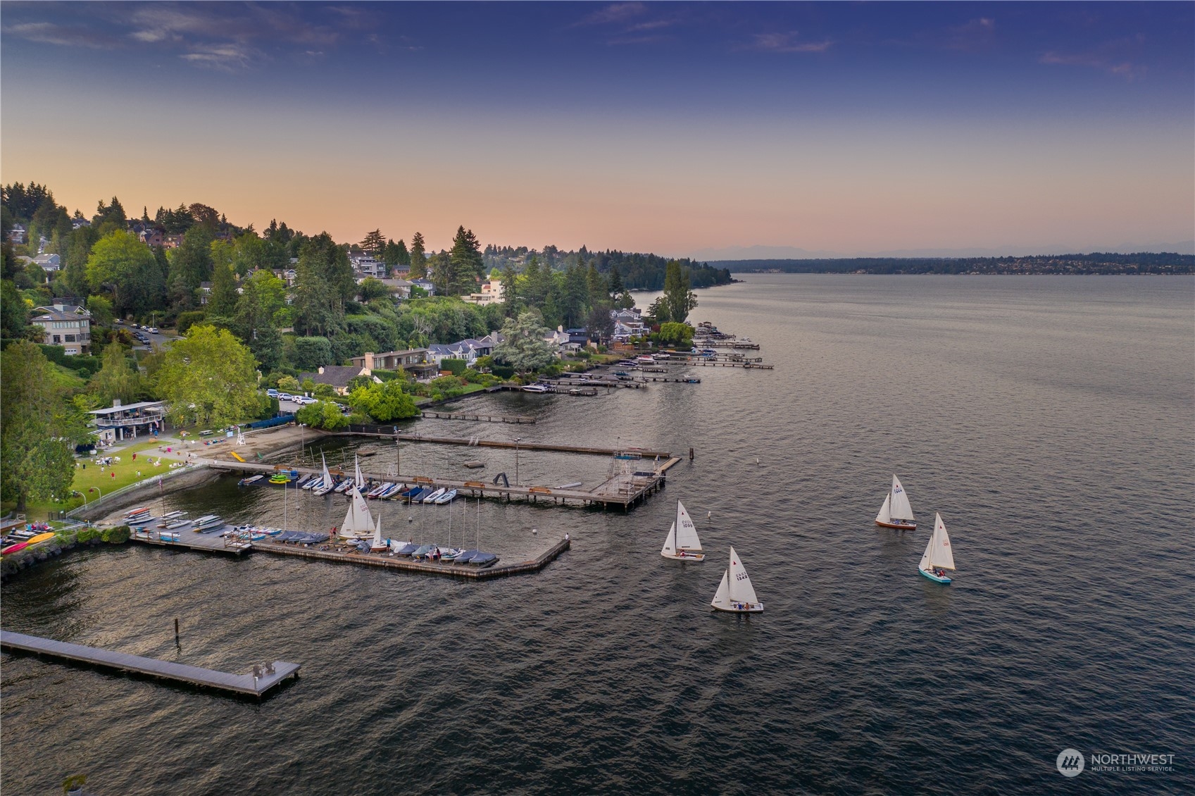 5108 Northeast 42nd Street Seattle, WA 98105 - Photo 36 of 40 a view of a lake from a yard