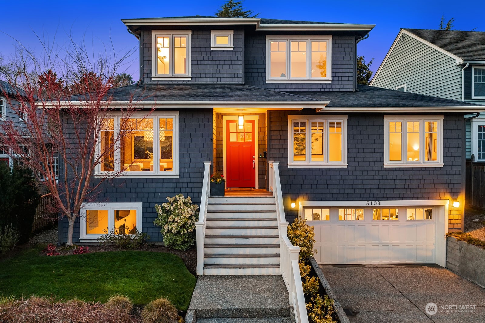 5108 Northeast 42nd Street Seattle, WA 98105 - Photo 40 of 40 a front view of a house with a yard
