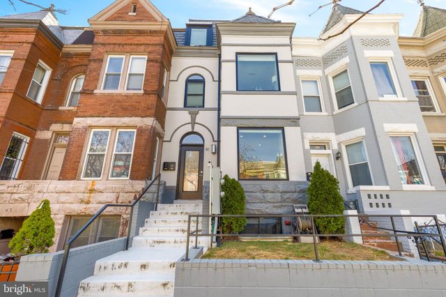 a front view of a multi story residential apartment building