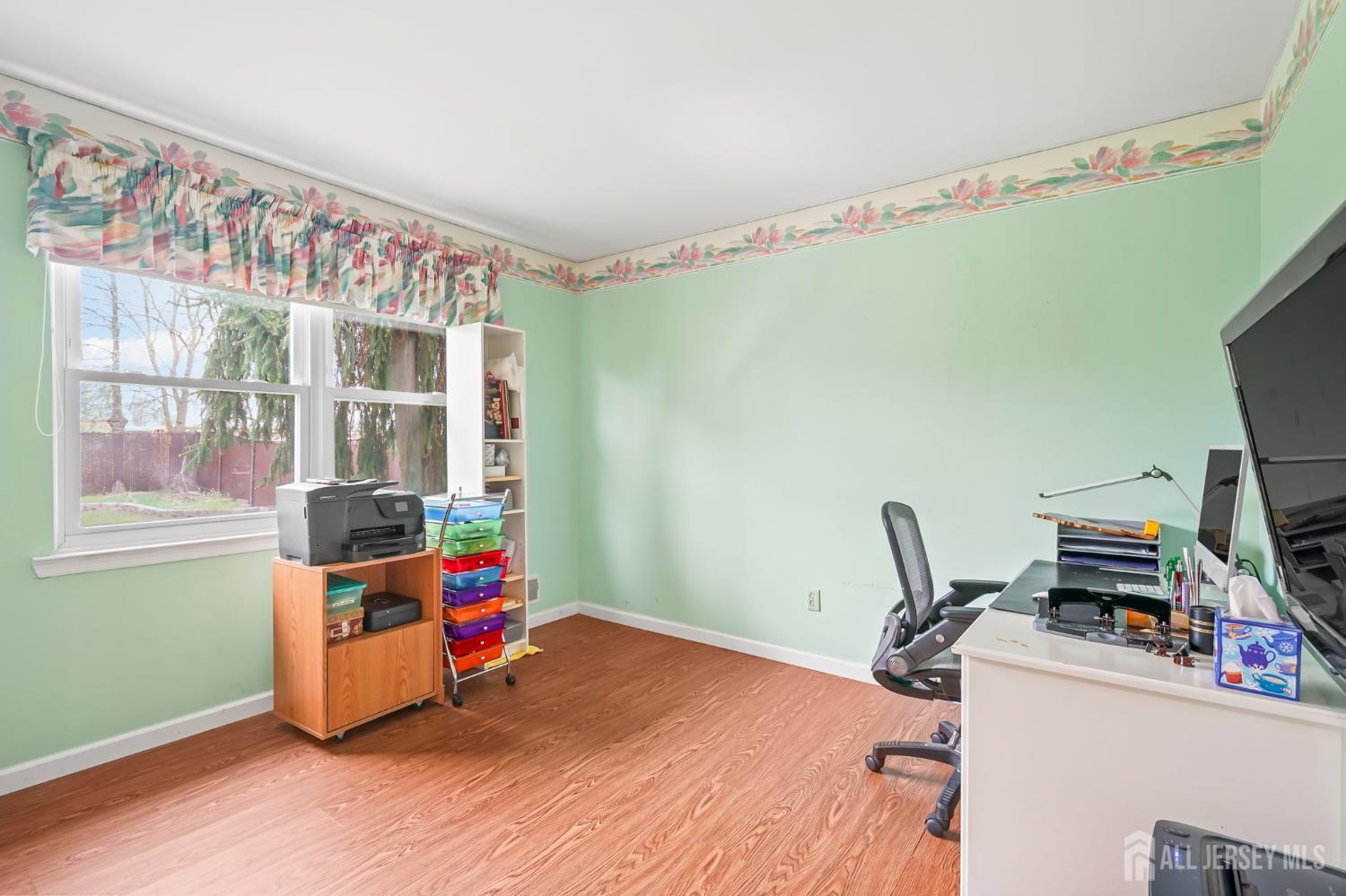 41 Rodak Circle Edison, NJ 08817 - Photo 17 of 28 a room with a window and gym equipment