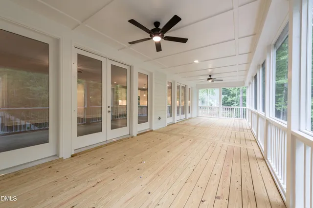 a view of an empty room with a bathroom