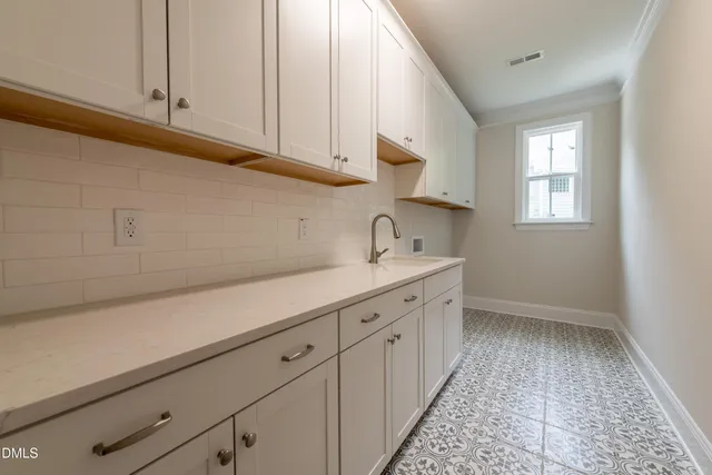 a view of an empty walk in closet