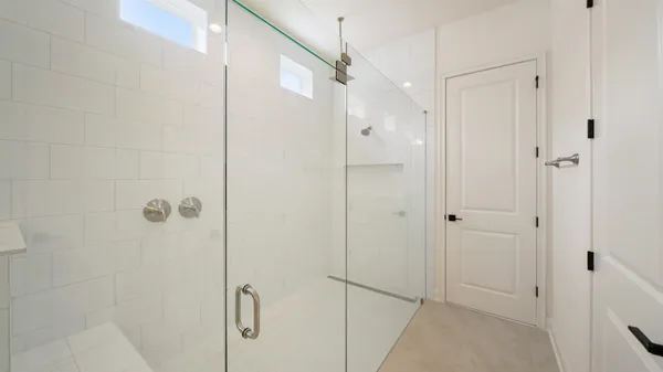 a view of an entryway with wooden floor