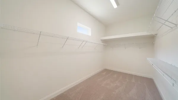 a view of a room that has a window
