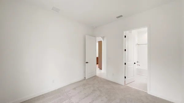 a bathroom with a granite countertop sink