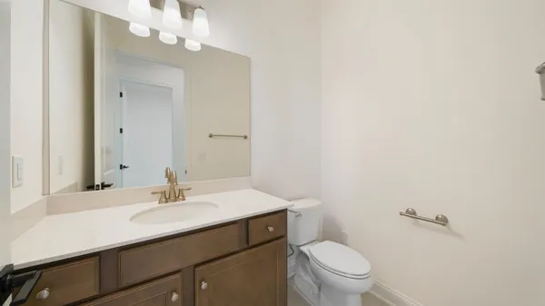 a view of a hallway with window and stairs