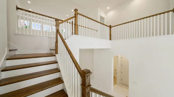 a bathroom with a double vanity sink and mirror
