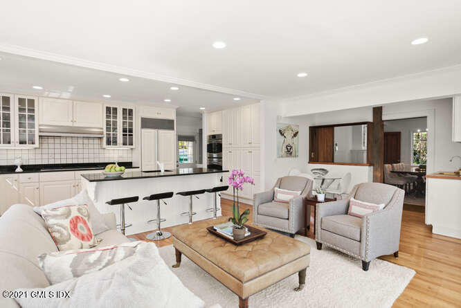 23 Parsonage Road Greenwich, CT 06830 - Photo 12 of 41 a living room with furniture and kitchen view