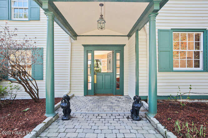 23 Parsonage Road Greenwich, CT 06830 - Photo 3 of 41 a front view of a house