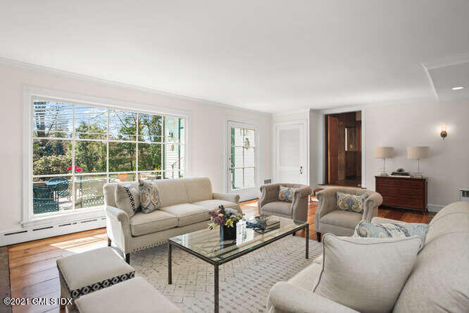 23 Parsonage Road Greenwich, CT 06830 - Photo 6 of 41 a living room with furniture and a large window