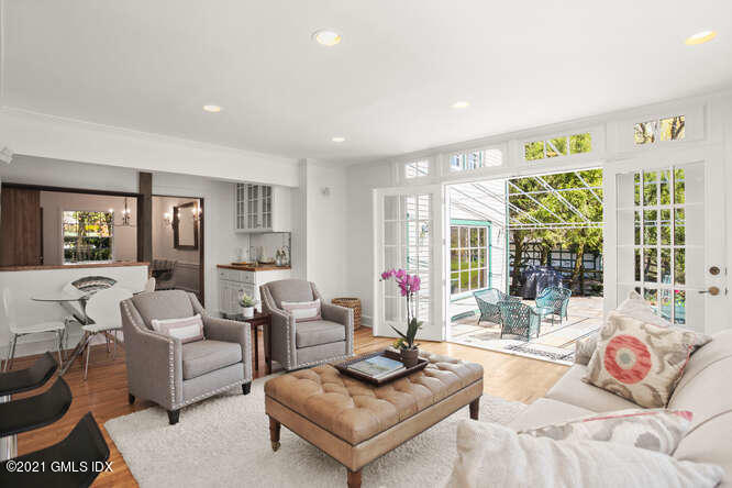 23 Parsonage Road Greenwich, CT 06830 - Photo 10 of 41 a living room with furniture and large windows