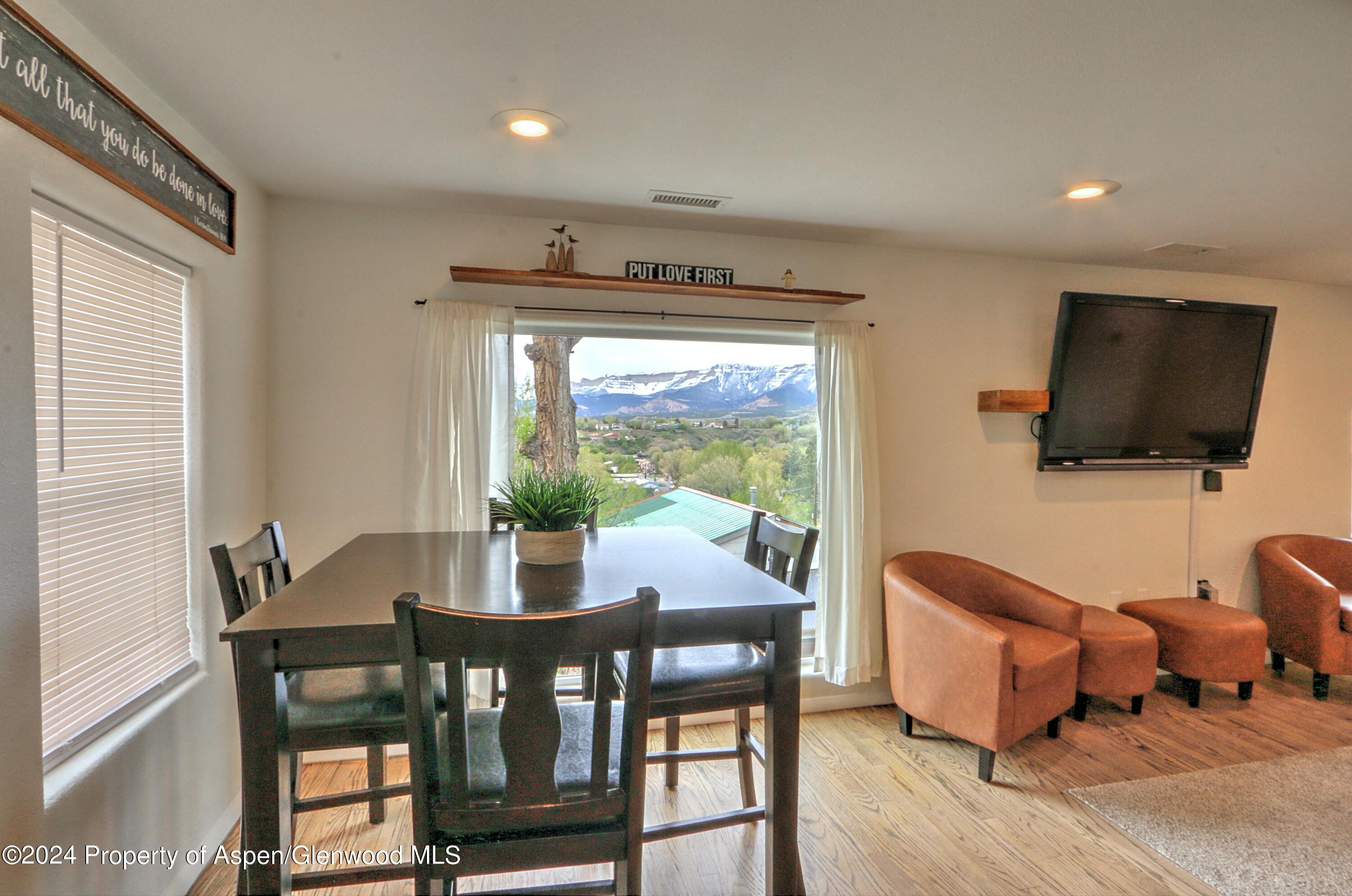 412 East 4th Street Rifle, CO 81650 - Photo 7 of 18 a view of a dining room with furniture window and outside view