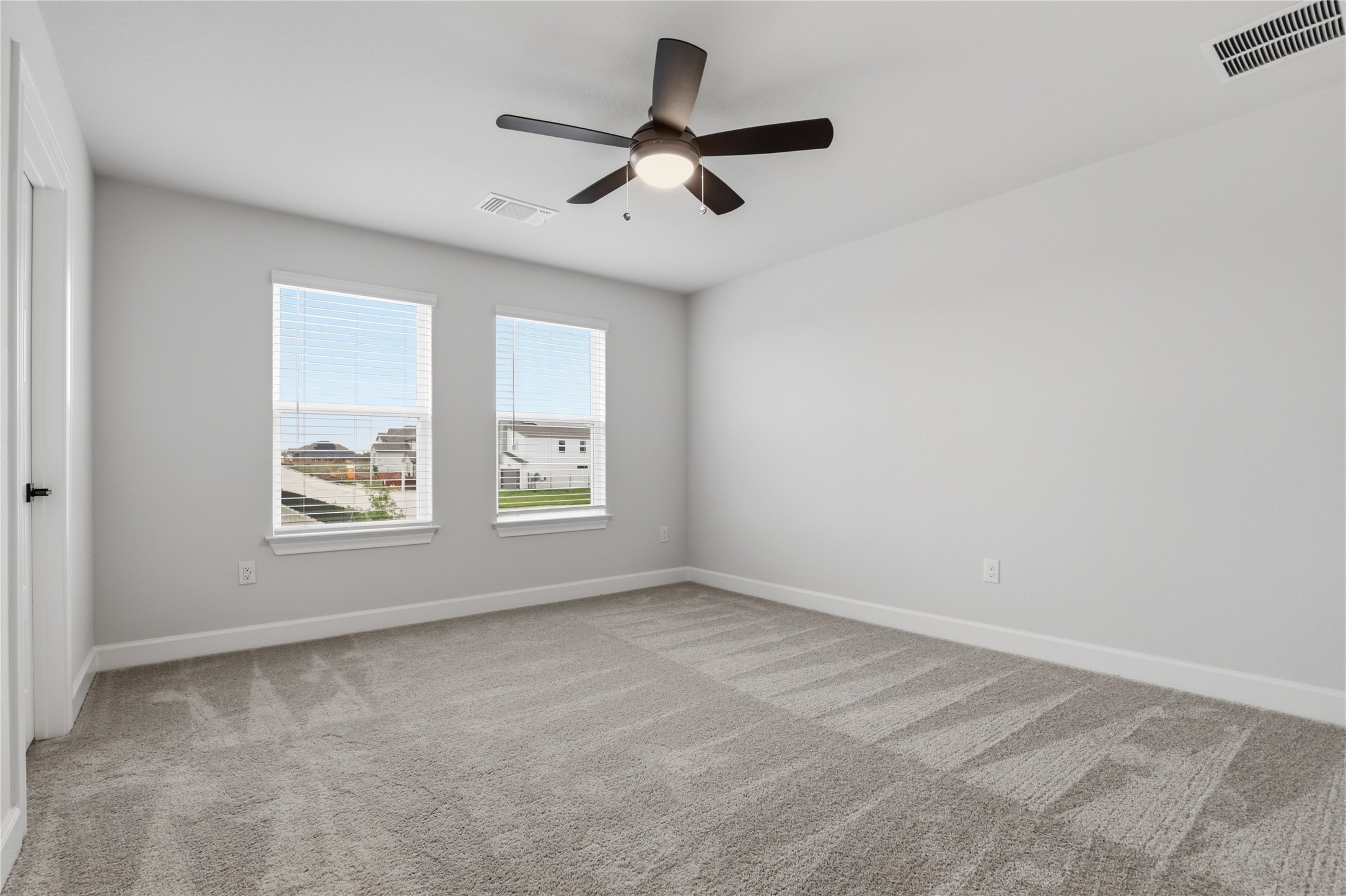 9320 Gladsome Path Manor, TX 78653 - Photo 26 of 34 an empty room with a window