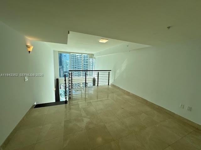 41 Southeast 5th Street, Unit 2112 Miami, FL 33131 - Photo 12 of 45 an empty room with windows